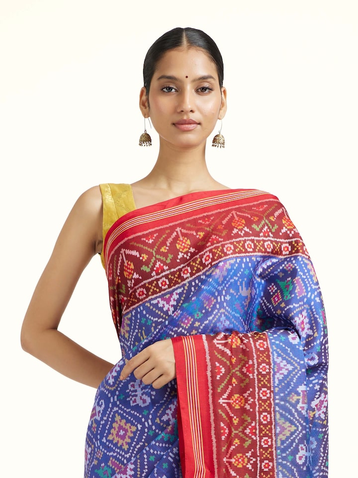 Angled view of the Light Blue Patan Patola Handloom Silk Saree