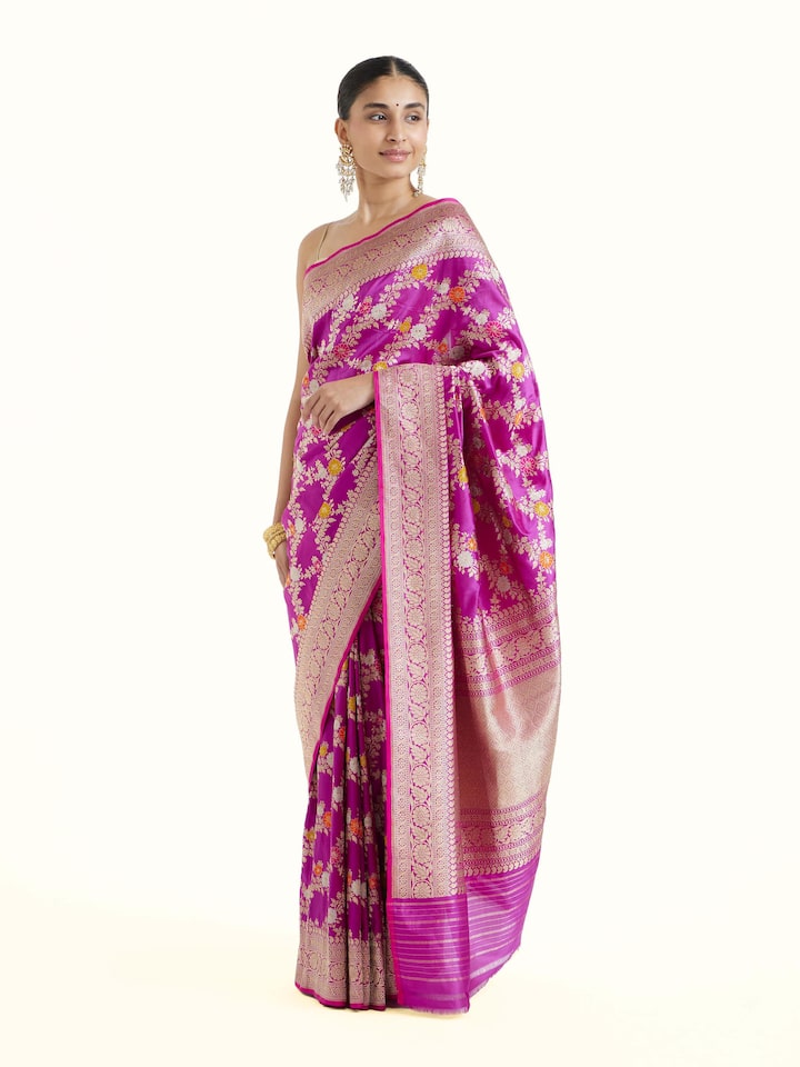 Side view of magenta Banarasi silk kadwa jaal saree with elegant drape and ornate border