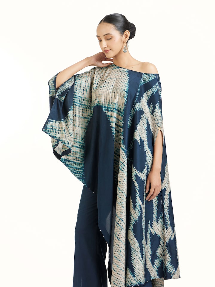 Angled view of blue silk Shibori co-ord set highlighting Shibori technique
