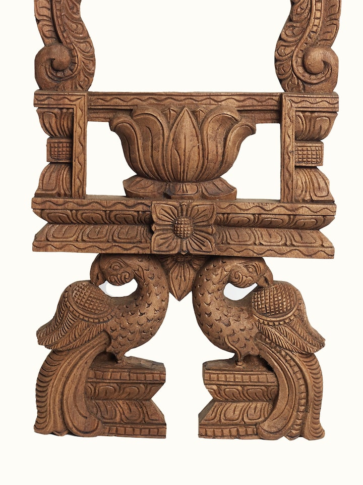 Detail view of the Wood Carved Parrot Mirror Panel