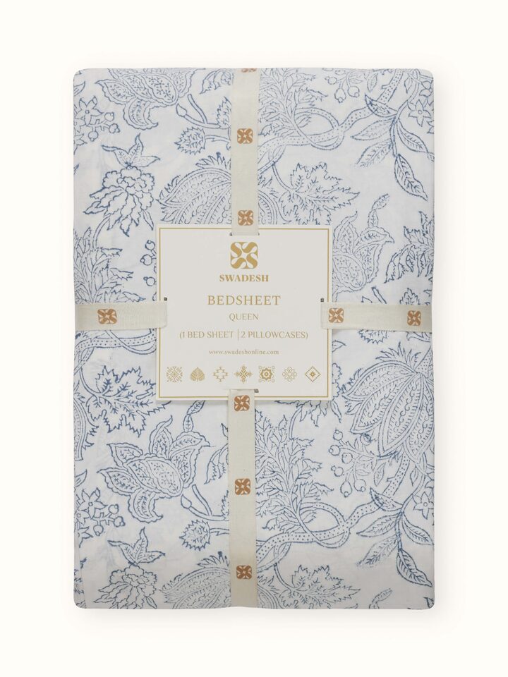 Back view of Kairavam blue floral cotton bedsheet showing neat finish and hem detailing