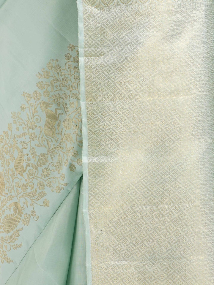 Detail view of blue silk Kancheepuram saree showcasing zari craftsmanship