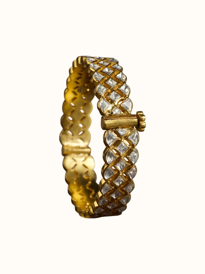 front view of silver smithing gold plated bangle with polished finish