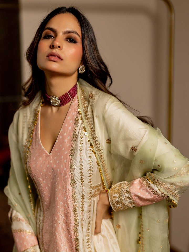 Angled view of the Mint Green Silk Embroidered Organza Dupatta