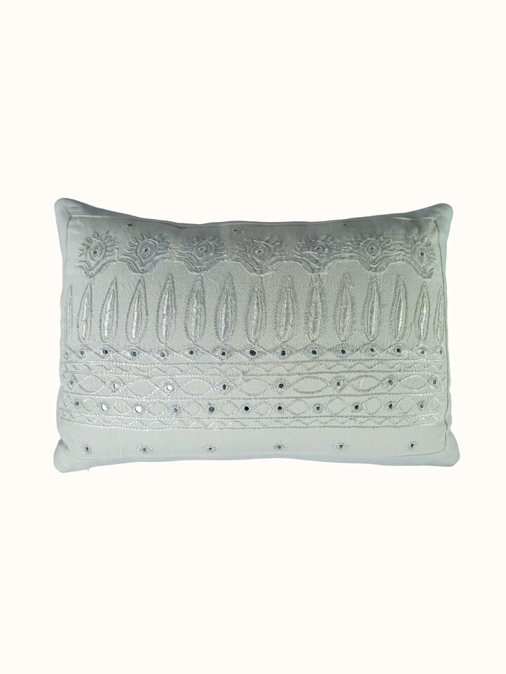 Front view of the Swadesh Lippan White Pakko Border Hand Embroidered Cotton Cushion Cover