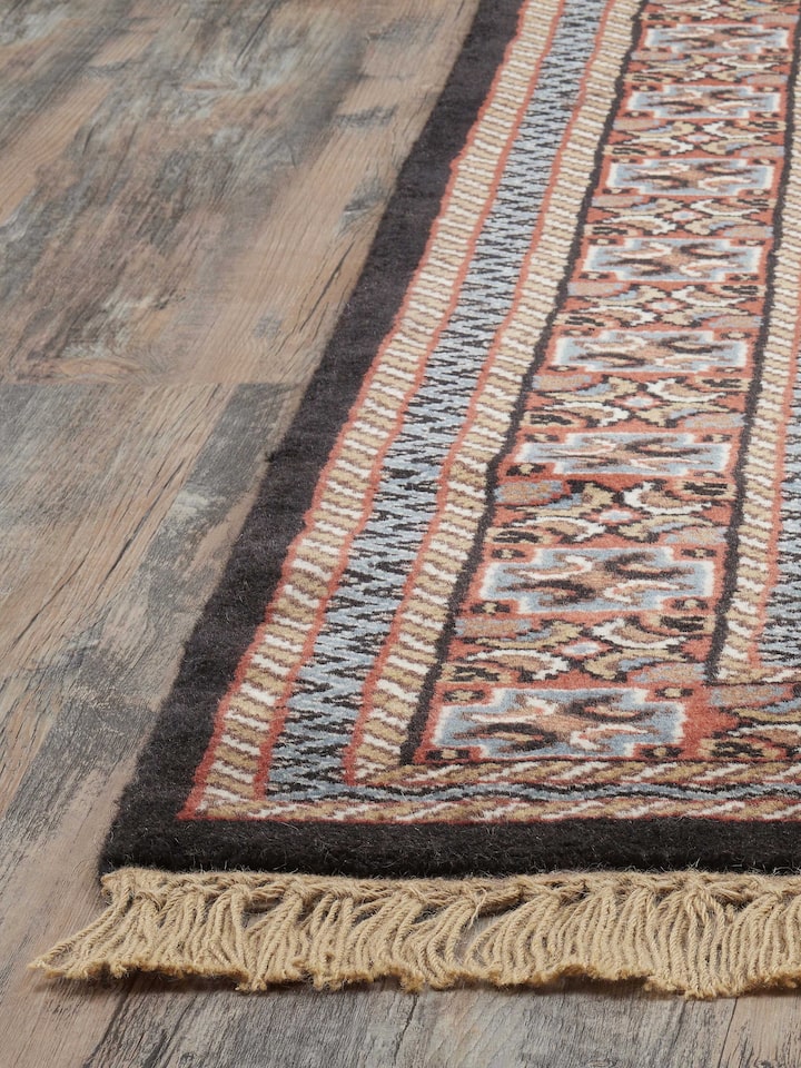 Front view capturing the rich color contrast and detailed Gwalior wool craftsmanship