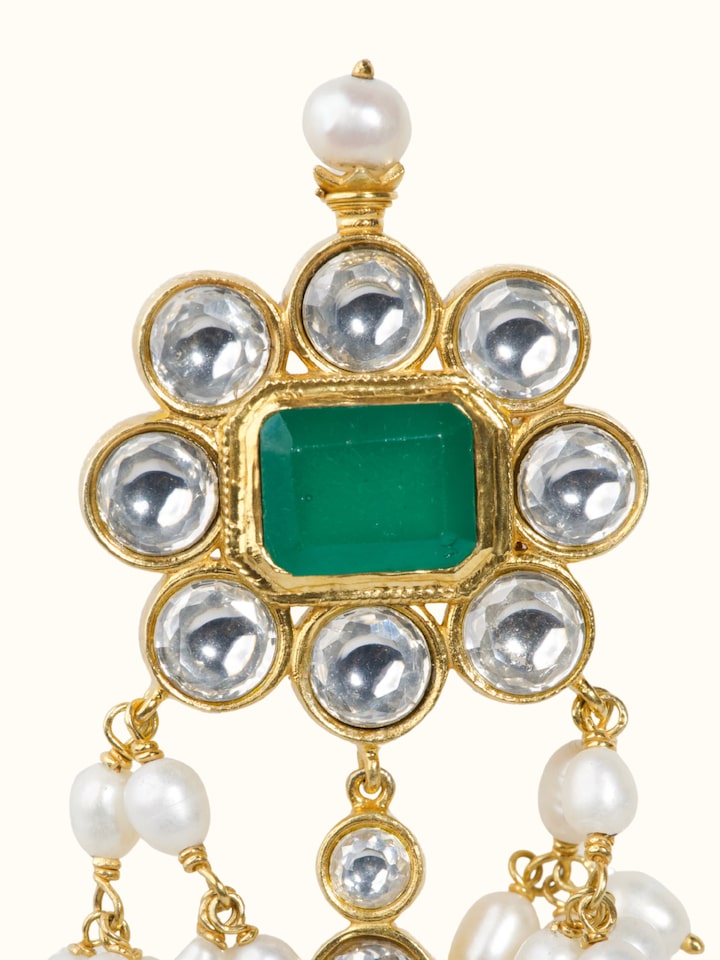 Close-up of pearl detailing on Guttapusalu silver drop earrings