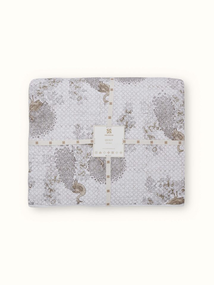 Detailed design of Shivranjini beige floral cotton Sanganeri block printed double quilt