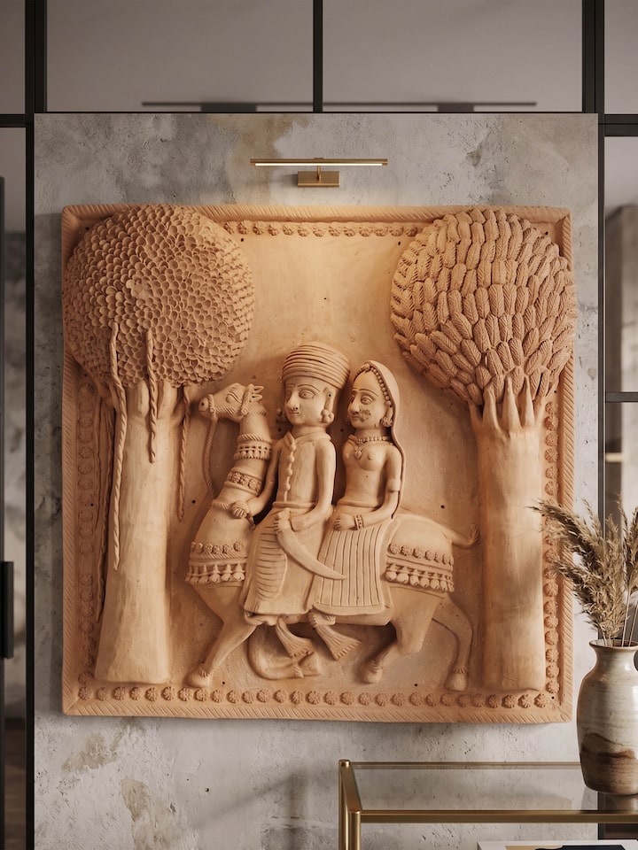 Side view of the Terracotta Clay Dhola Maru Sculpture