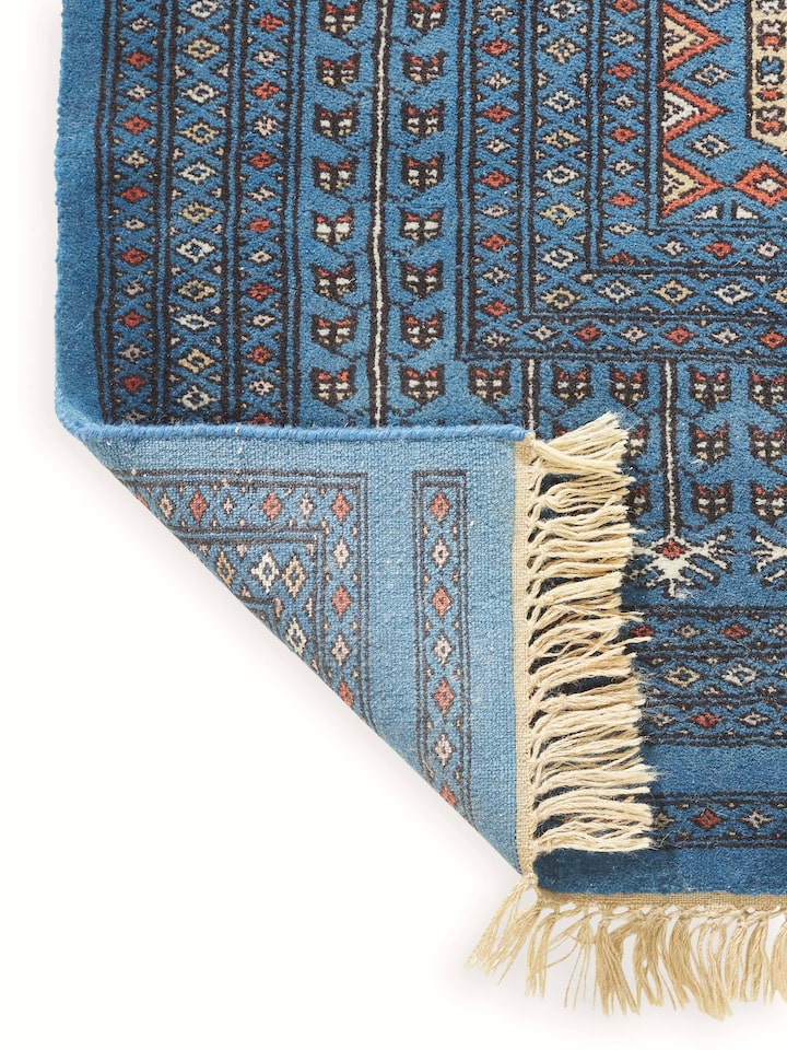 Back view of Amritsari Parda Blue Gwalior Wool Hand-knotted Rug showing the reverse weave