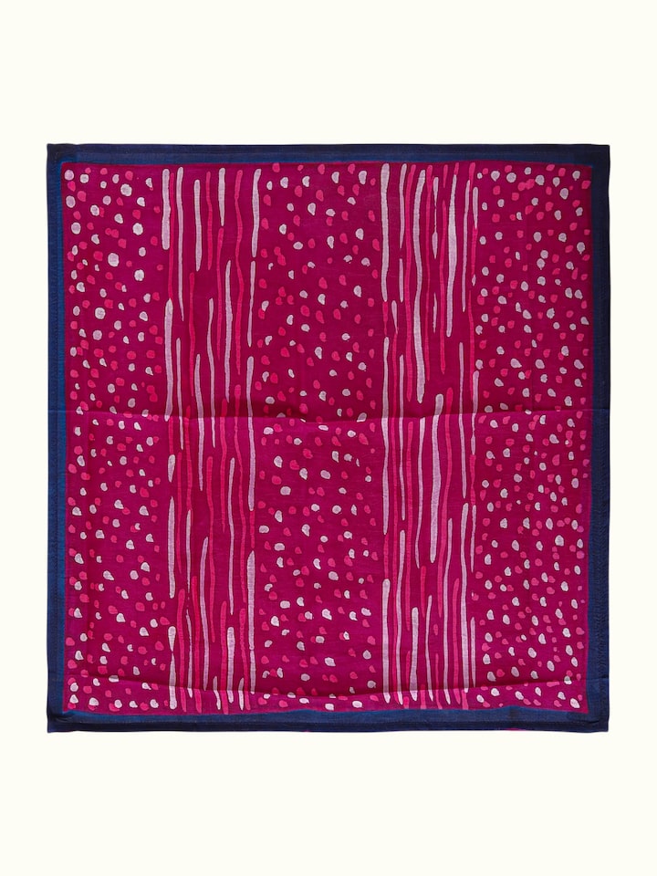 detail view of assorted silk discharge block printed pocket squares set with patterns