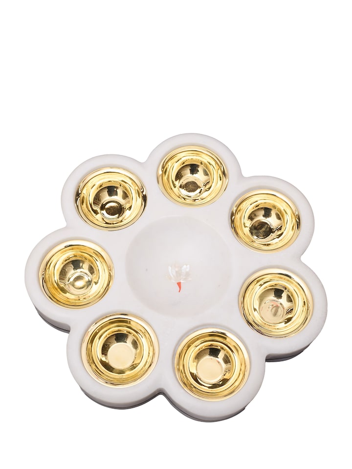 angled view of marble pacchikari dryfruit bowl