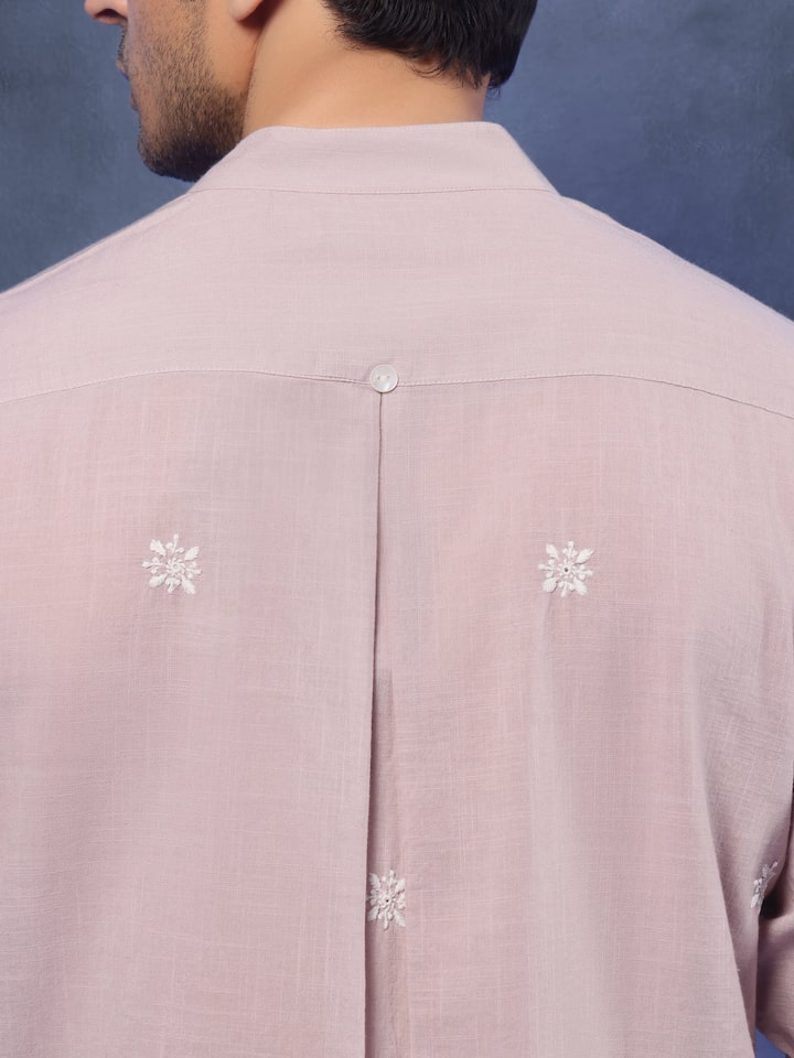 Angled view of Grey Cotton Chikankari Shirt revealing the depth of its color and intricate pattern
