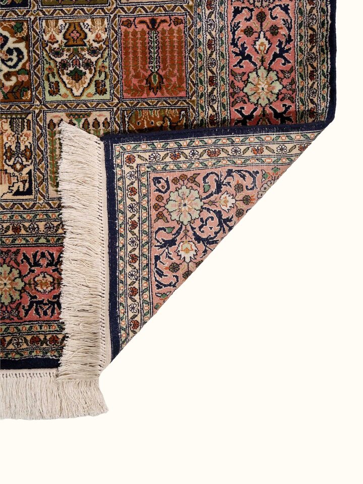 Back view of Traditional Persian Pink Dabdar Kashmir Silk Hand-Knotted Carpet showing the reverse weave