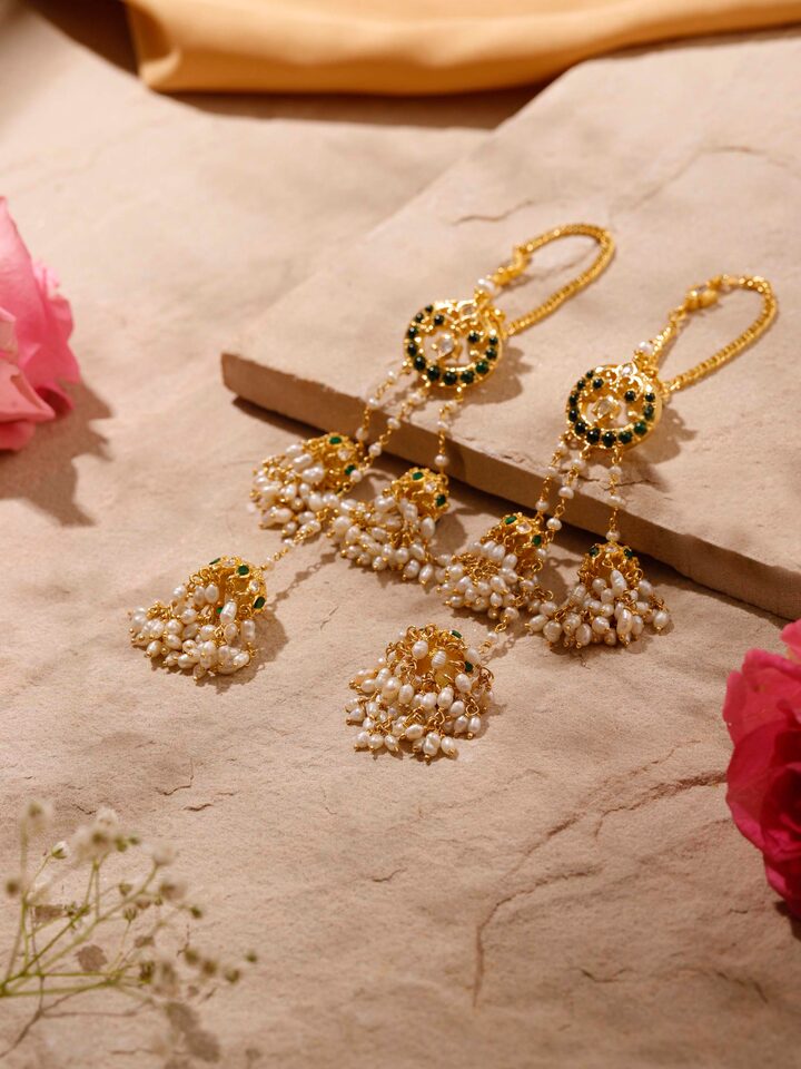 Overhead view displaying elegant shape and craftsmanship of Guttapusalu silver drops