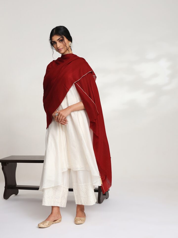 Side view of maroon cashmere kaaj embroidered handwoven stole highlighting soft texture