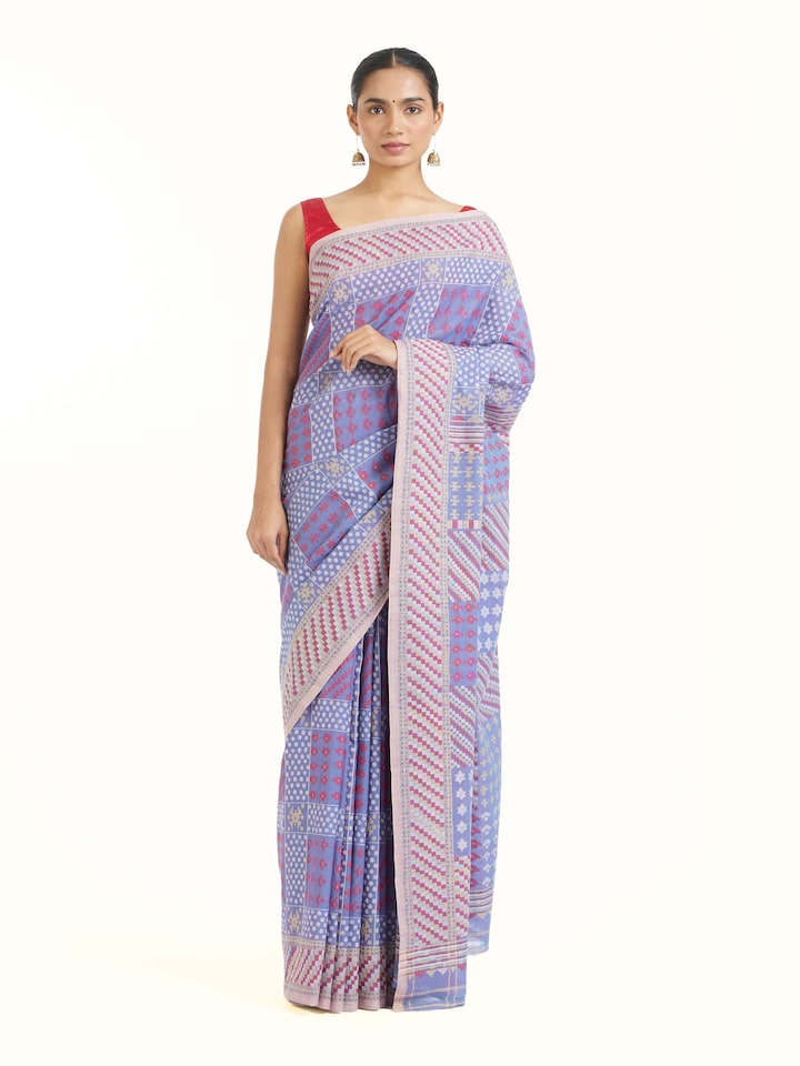 Front view of beige cotton Bengal Jamdani saree with delicate woven motifs