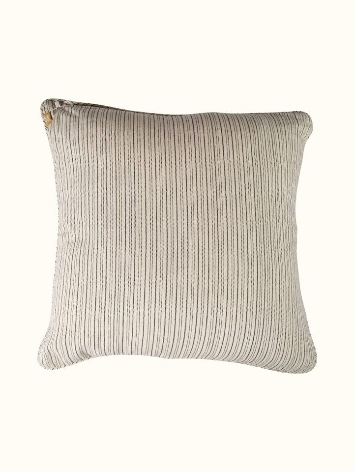 Folk geo hand embroidered cushion cover, back view with fabric texture