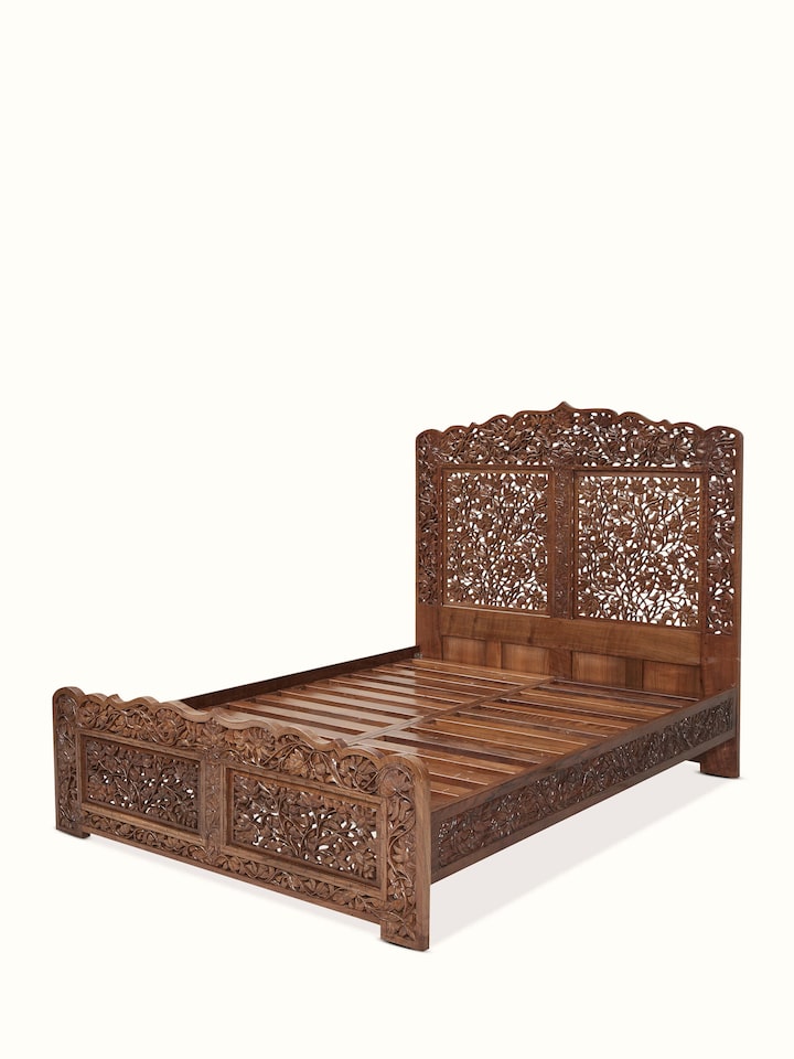 Side angle of Carved Walnut Wood Queen-size Bed showing the full frame structure