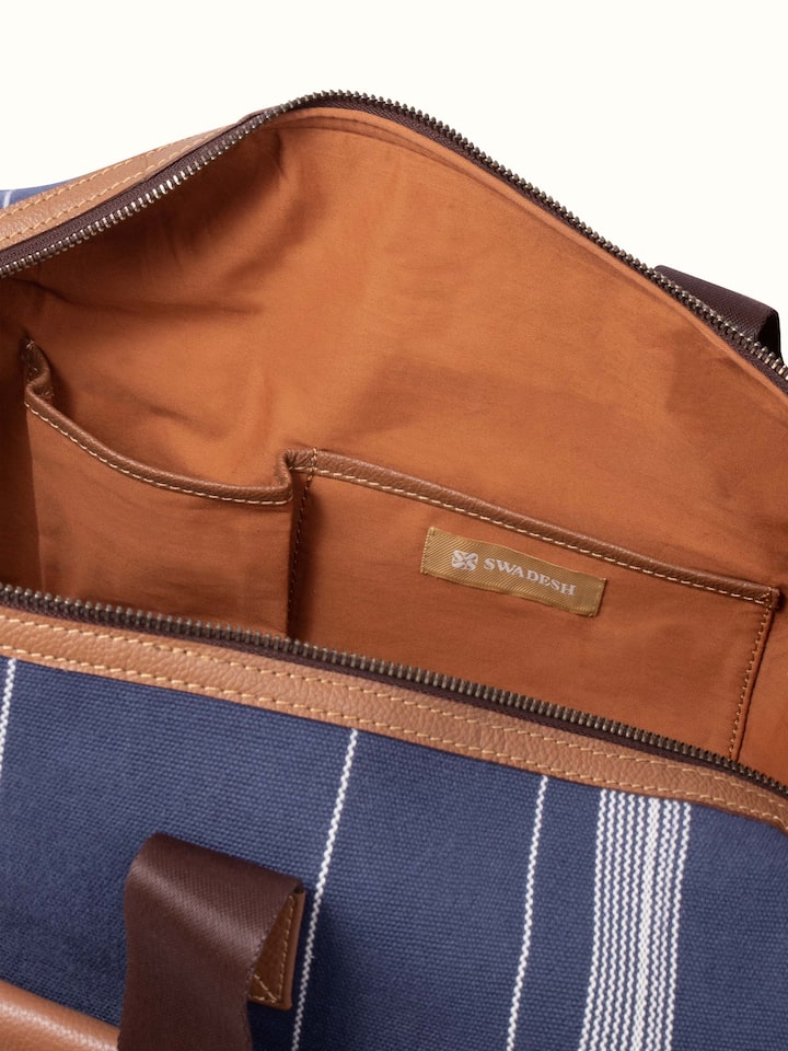 Close-up of Blue Handloom Cotton Duffle Bag emphasizing the intricate detailing and quality