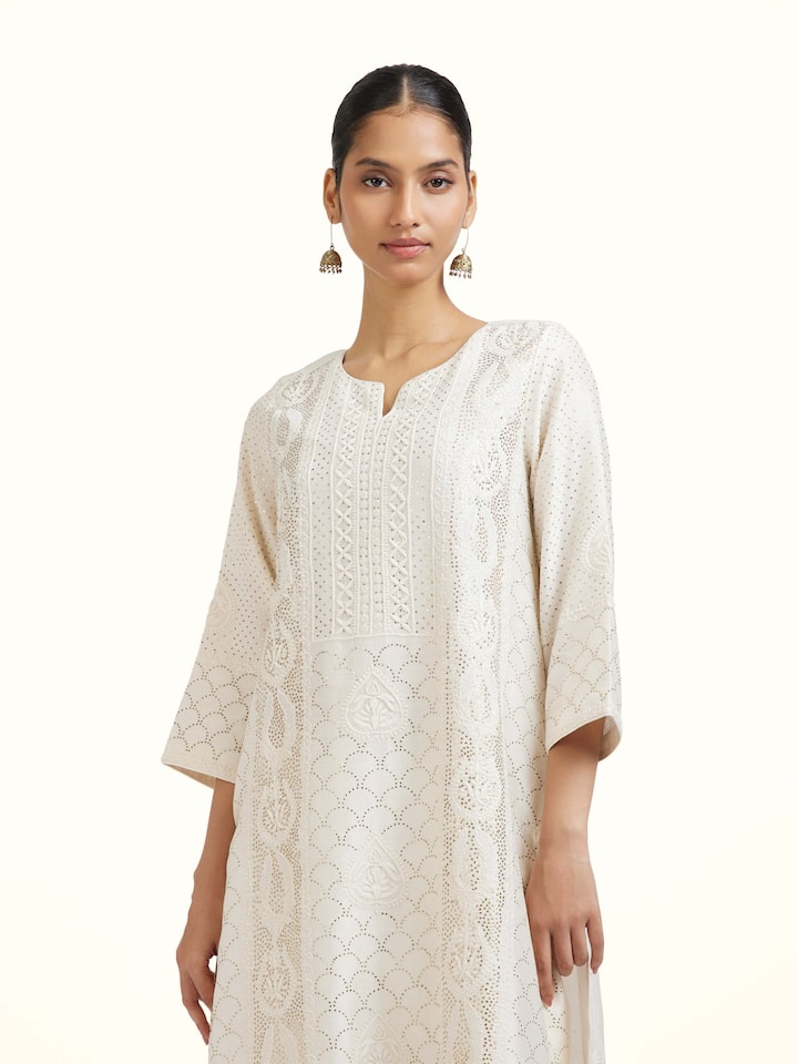 Angled view of the White Chanderi Cotton Silk Chikankari A-Line Kurta