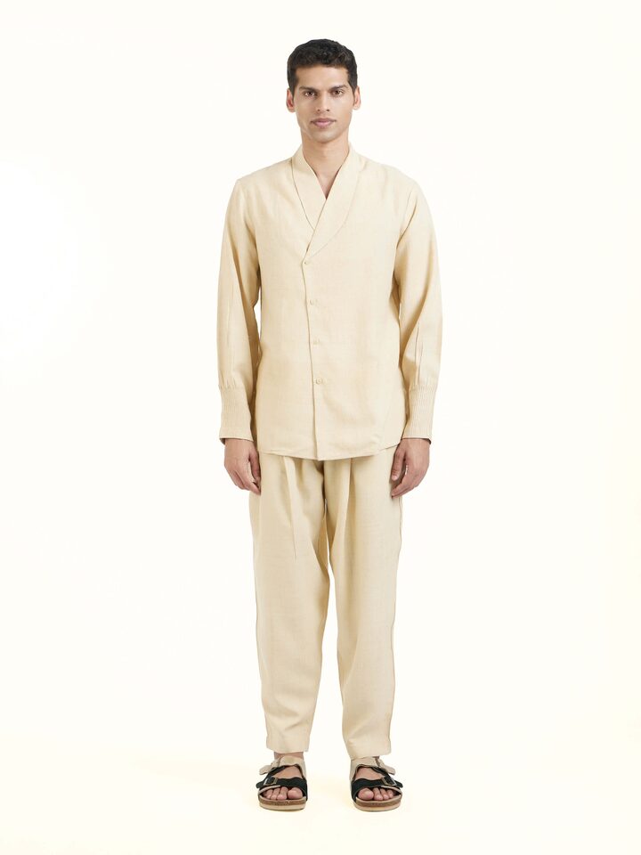 Front view of beige silk handloom jacket showcasing clean structure and texture