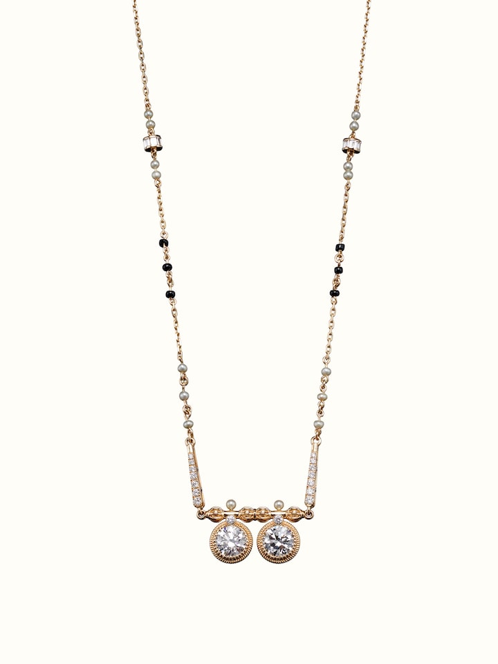 front view of open setting 14 karat gold mangalsutra with minimalist pendant