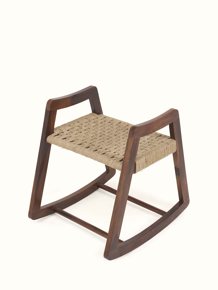 Angled view of Swadesh Sheesham Wood Jute Woven Stool displaying its stylish jute seat and solid wood legs