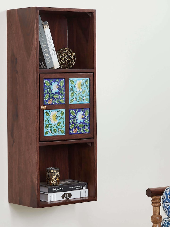 Sheesham Wood Blue Pottery Wall Shelf (1 Door) featuring traditional blue pottery design and elegant sheesham wood frame.