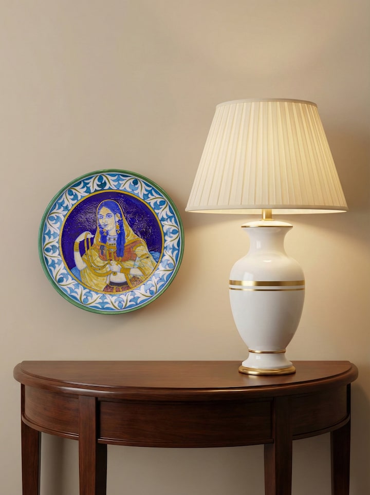 lifestyle view of blue pottery mughal woman display plate with traditional design