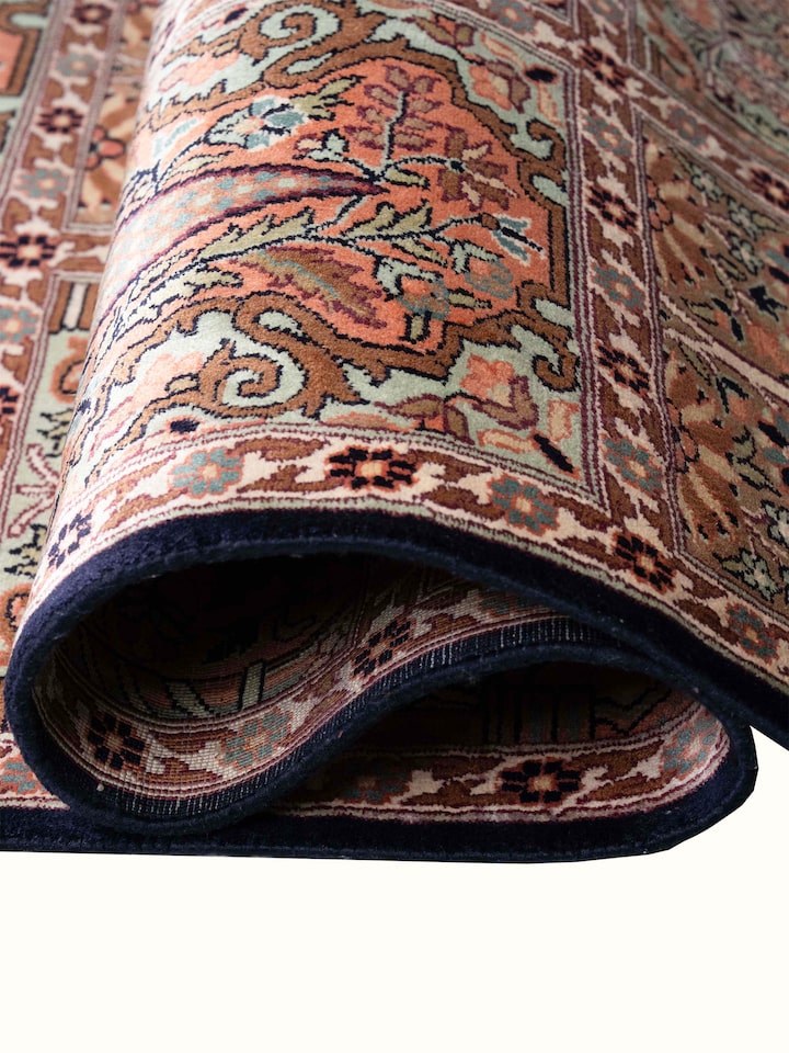 Detail view of Traditional Persian Grey Hamadan Kashmir Silk Hand-Knotted Carpet highlighting the intricate pattern and pile texture, from a differ...