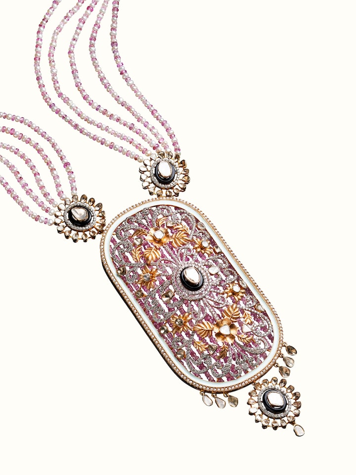 angled view of open setting 14 karat gold long necklace