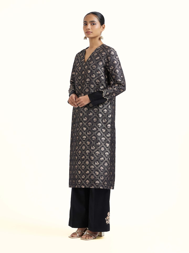 Side view of black silk Banarasi kurta set highlighting classic silhouette