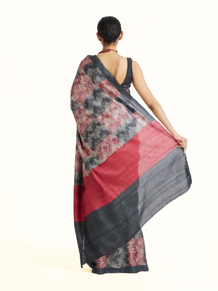 Back view of Black Tussar Silk Discharge Block Printed Saree emphasizing the overall design and fine details