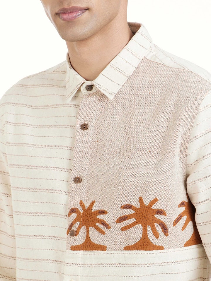 Detailed view of Ivory Kutchi Embroidered Shirt focusing on the fine craftsmanship and texture