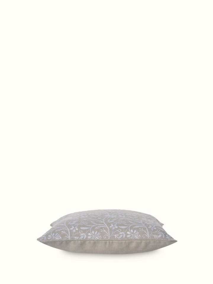 Close-up view of Rann Beige Allover Linen Chikankari Hand Embroidered Cushion Cover highlighting the weave and stitch detail