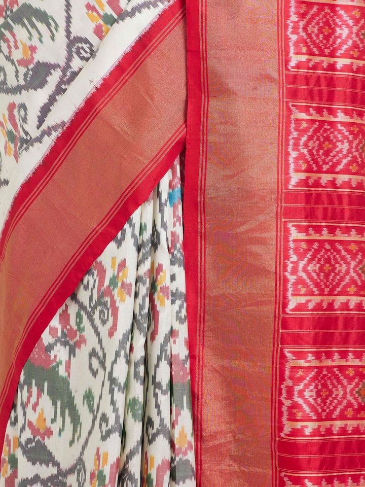 Detail view of Off-White Pochampally Ikat Silk Saree highlighting the intricate weave pattern