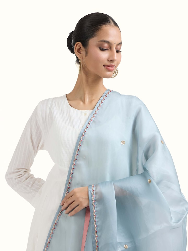 Angled view of Powder Blue Zardozi Hand Embroidered Dupatta revealing the depth of its color and intricate pattern