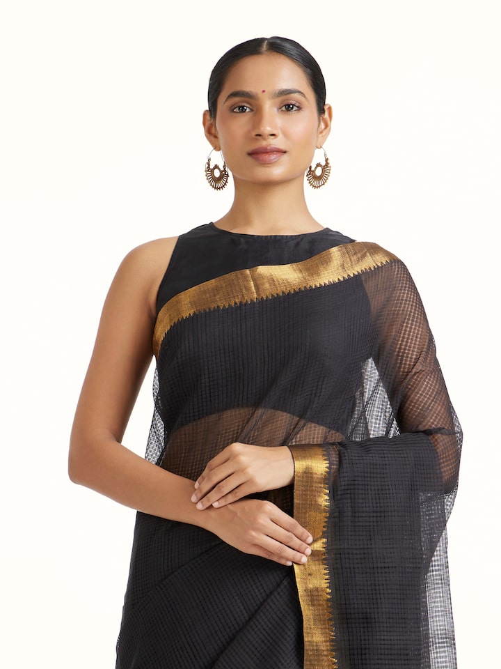 Angled view of Black Cotton Blend Mangalgiri Saree revealing the depth of its color and intricate pattern
