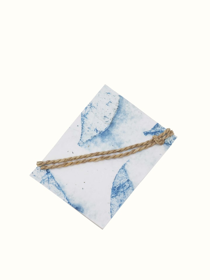 Front view of Auroville Handmade Paper Gift Tags in blue color, showcasing five intricately crafted gift tags