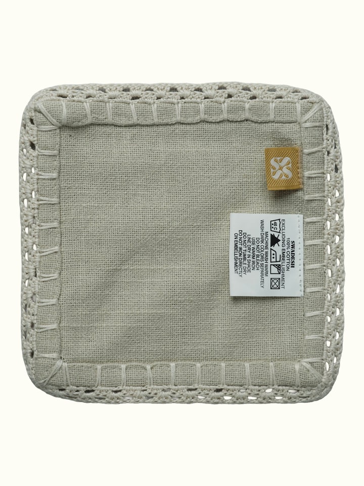 Back view of Nityam Beige Cotton Slub Crochet Coasters Set Of 6 showing the reverse side