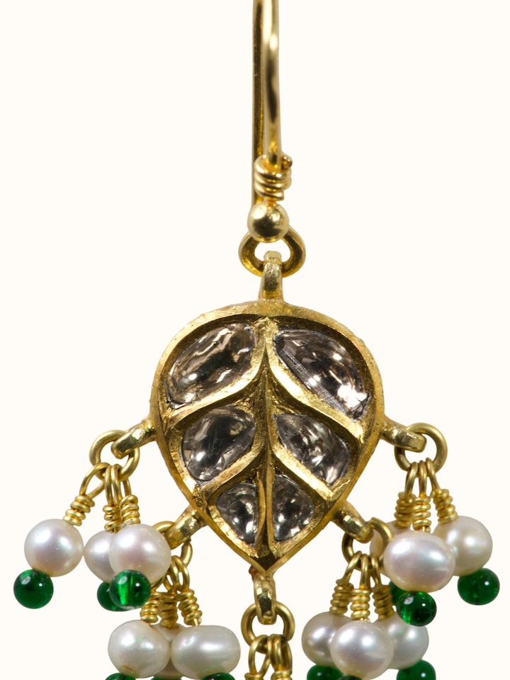 Close-up of the Jadau 18 Karat Gold Drop Earrings craftsmanship