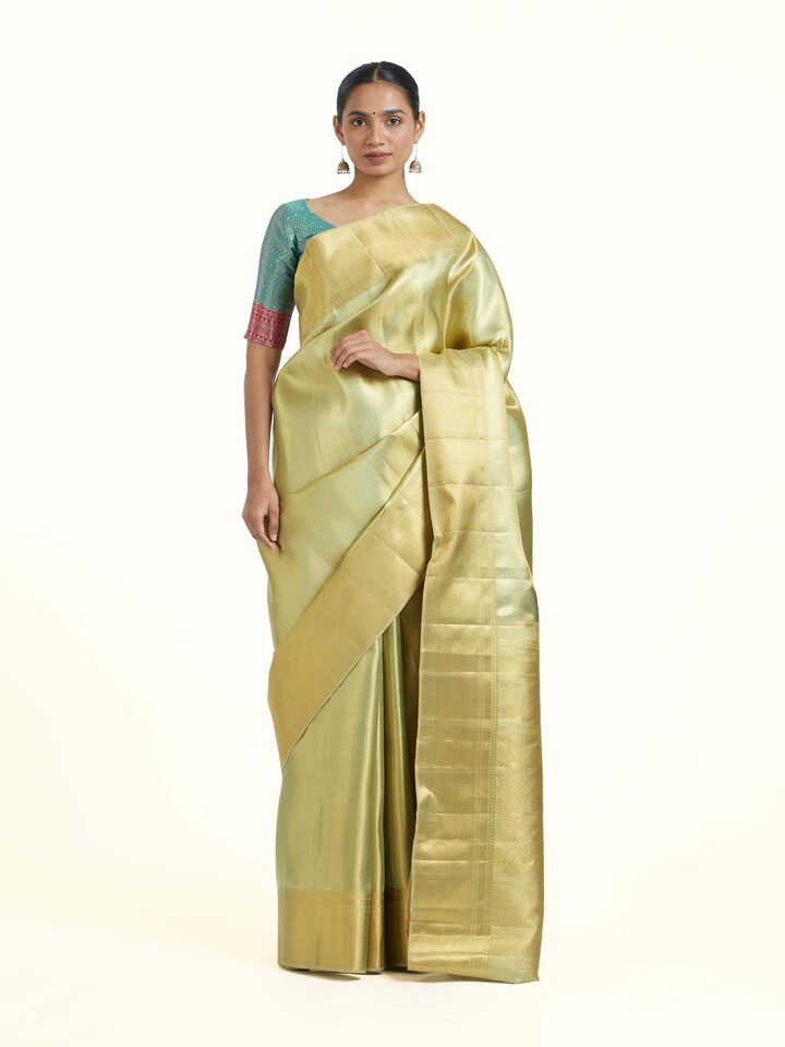 Front view of Green Kancheepuram Silk Zari Saree showcasing its traditional craftsmanship and design