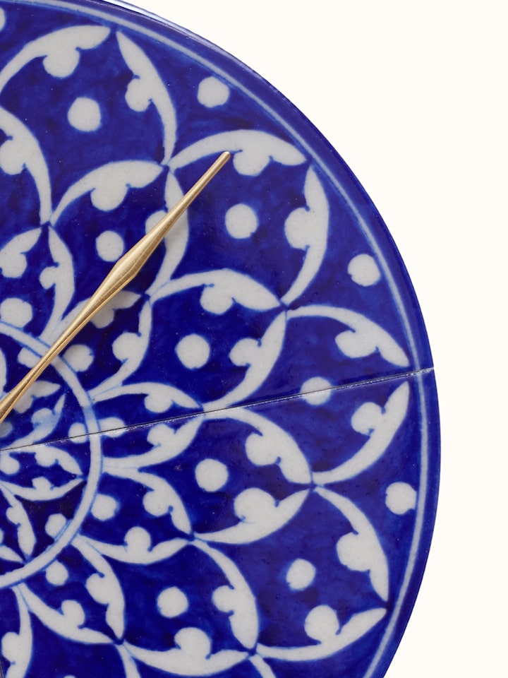 Detail shot of Blue Pottery Ceramic Wall Clock