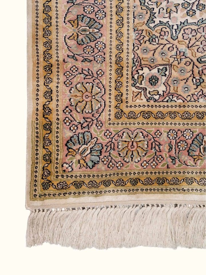 Detail view of Traditional Persian Ivory Kashan Kashmir Silk Hand-Knotted Carpet highlighting the intricate pattern and pile texture