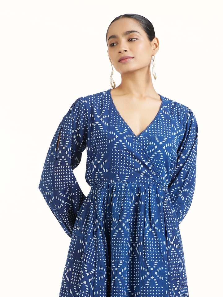 Angled view of Samika cotton dabu block printed dress highlighting dabu print technique