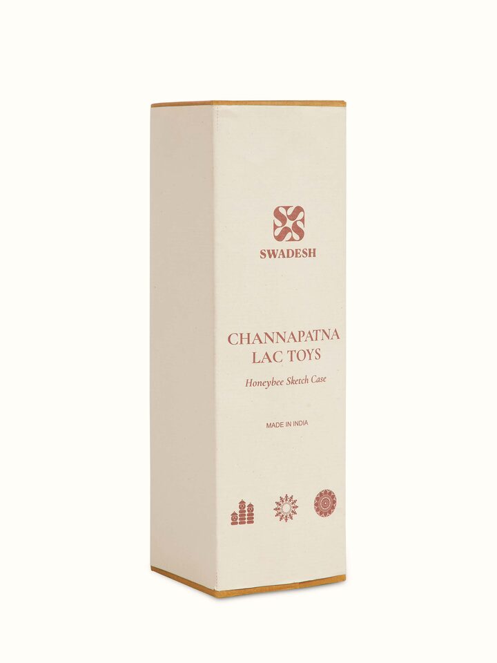 Back view of Channapatna Ivory Wood Sketch Kase in Red highlighting overall design