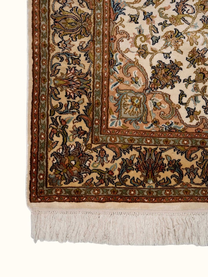 Detail view of Traditional Persian Ivory Kashan Kashmir Silk Hand-Knotted Carpet highlighting the intricate pattern and pile texture