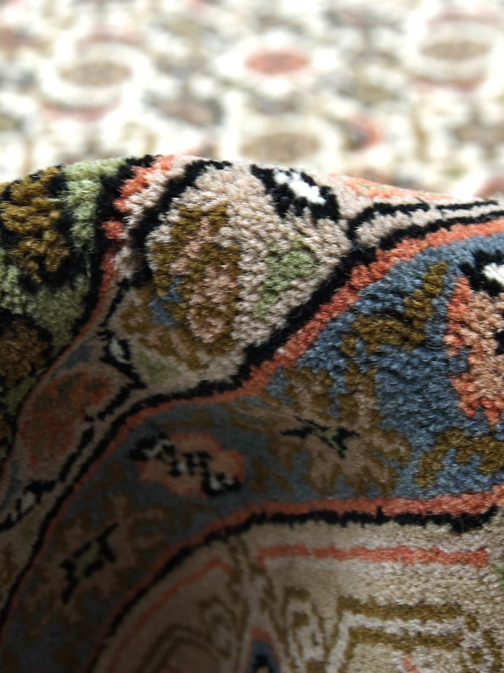 Detail view of Traditional Persian Herati Beige Bhadohi Wool Hand Knotted Rug highlighting the intricate pattern and pile texture, in an alternate...