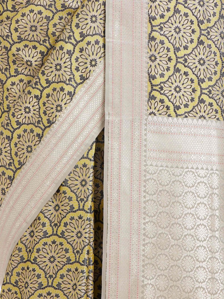 detail view of yellow banarasi brocade saree pattern